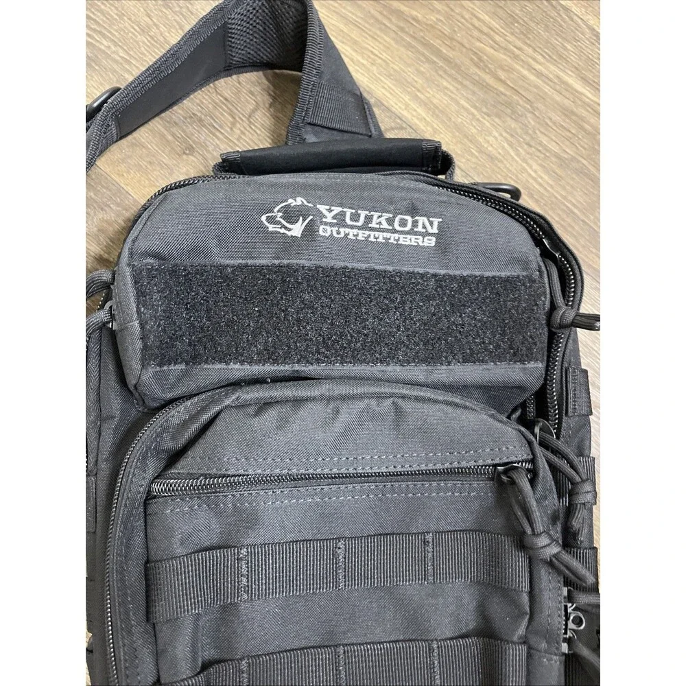 YUKON OUTFITTERS Men's Black Sling Bag (Single Strap) Pockets Backpack